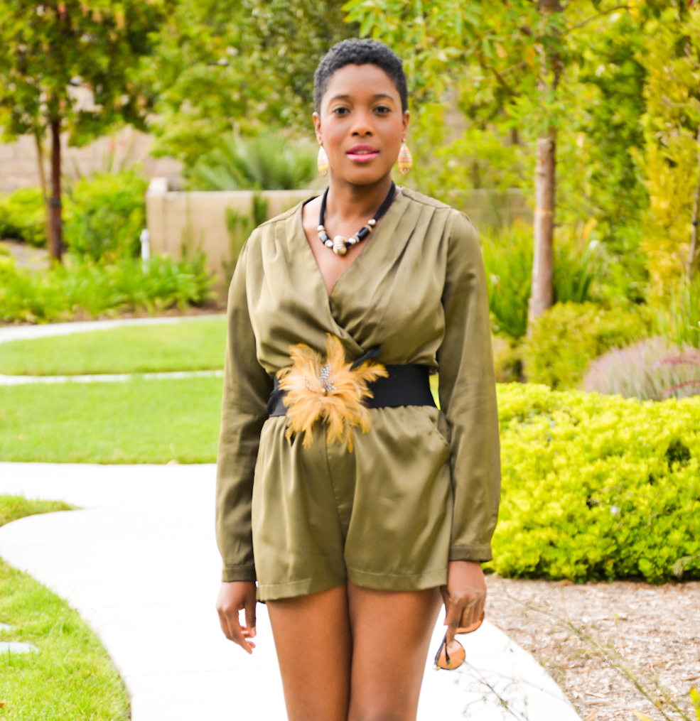 green romper and camouflage booties
